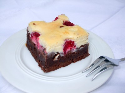 Brownie met cheesecake topping en frambozen<div class='yasr-stars-title yasr-rater-stars'
                          id='yasr-visitor-votes-readonly-rater-636e369ba5d32'
                          data-rating='3.5'
                          data-rater-starsize='16'
                          data-rater-postid='438'
                          data-rater-readonly='true'
                          data-readonly-attribute='true'
                      ></div><span class='yasr-stars-title-average'>3.5 (15)</span>
